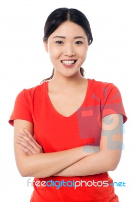 Casual Young Girl Posing, Arms Crossed Stock Photo