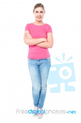 Casual Young Girl Posing, Arms Crossed Stock Photo