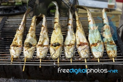 Cat Fish On The Grill At The Market In Thailand Stock Photo