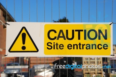 Caution Site Entrance Sign Stock Photo