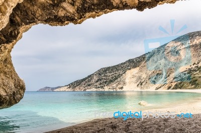 Cave Outlook On Sea Mountain And Beach Stock Photo