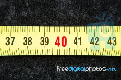 Centimeters Near A Tape Measure On The Number Fourty Stock Photo