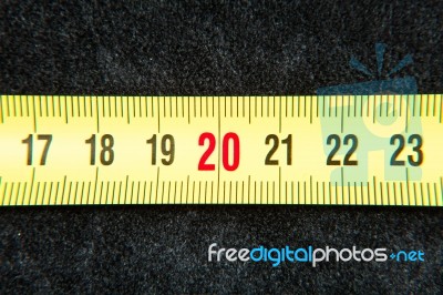 Centimeters Near A Tape Measure On The Number Twenty Stock Photo