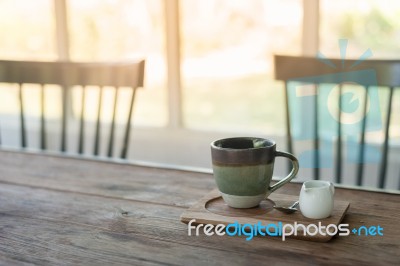 Ceramic Coffee Cup On Wood Table Stock Photo