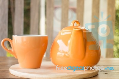 Ceramic Cup Of Tea And Teapot Stock Photo