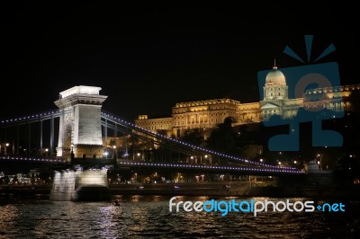 Chain Bridge Illuminated At Night In Budapest Stock Photo