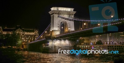 Chain Bridge Illuminated At Night In Budapest Stock Photo