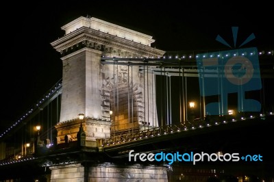 Chain Bridge Illuminated At Night In Budapest Stock Photo