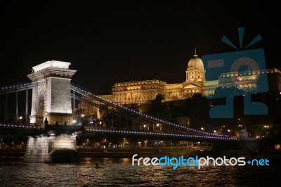 Chain Bridge Illuminated At Night In Budapest Stock Photo