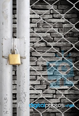 Chain Link Fence And Metal Door Stock Photo