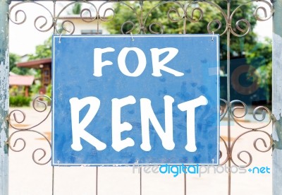 Chalkboard Sign In Front Of House For Rent Stock Photo