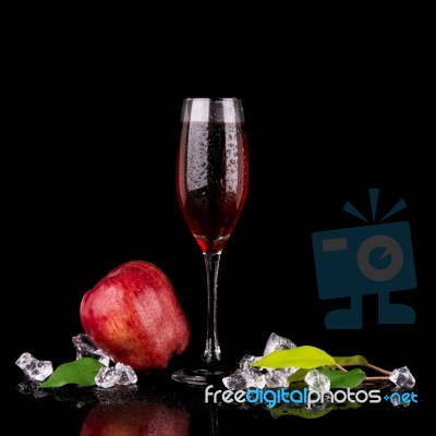 Champagne Glass With Apple Stock Photo