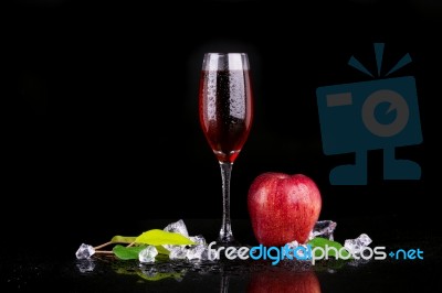 Champagne Glass With Apple Stock Photo