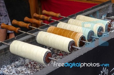 Charcoal Grilled Potato On A Market Stall In Bergamo Stock Photo