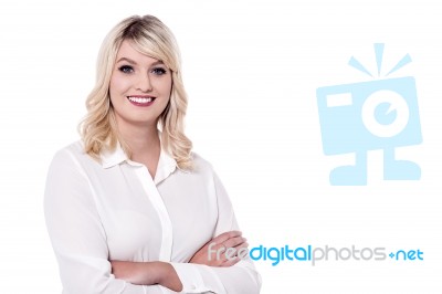 Charismatic Business Woman With Folded Arms Stock Photo