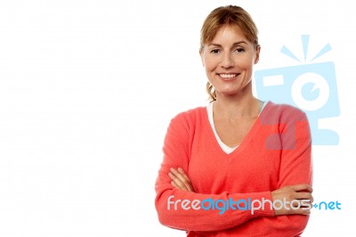 Charming Lady With Arms Crossed Stock Photo