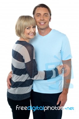 Charming Middle Aged Lady Embracing Her Husband Stock Photo