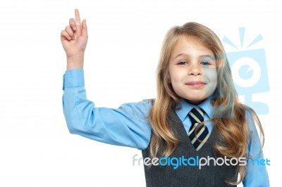 Charming School Girl With Raised Arm Stock Photo