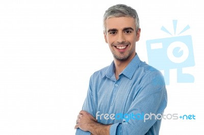 Charming Smiling Male Model, Arms Crossed Stock Photo