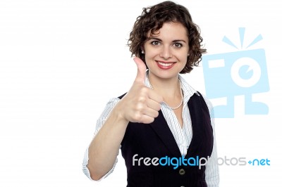 Charming Young Lady Gesturing Success Stock Photo