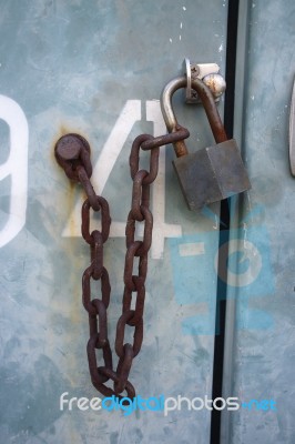 Check-lock And Chain On Iron Cabinet Stock Photo