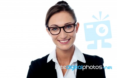 Cheerful Bespectacled Corporate Woman Stock Photo