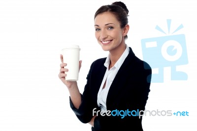 Cheerful Business Lady Holding Beverage Stock Photo