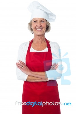 Cheerful Confident Aged Female Chef Stock Photo