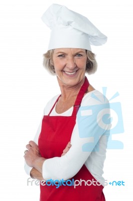 Cheerful Confident Aged Female Chef Stock Photo