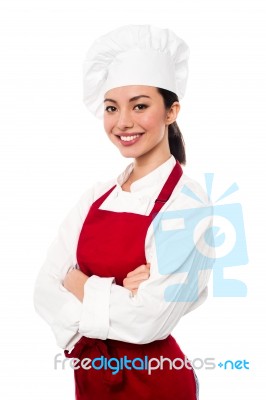 Cheerful Confident Young Female Chef Stock Photo