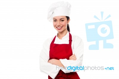 Cheerful Confident Young Female Chef Stock Photo