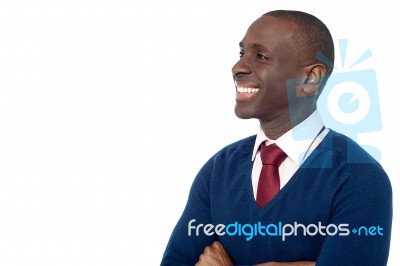 Cheerful Corporate Guy Looking Away Stock Photo