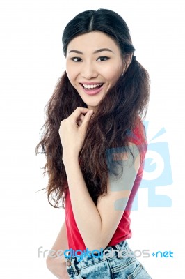 Cheerful Girl Posing In Casuals Stock Photo