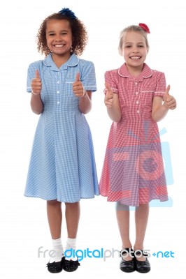 Cheerful Girls Showing Double Thumbs Up Stock Photo