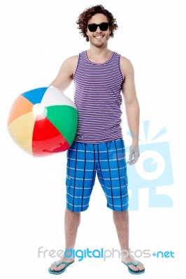 Cheerful Guy Ready To Play Beach Ball Stock Photo