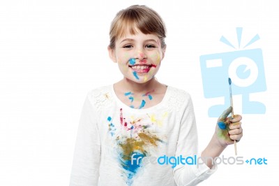 Cheerful Little Messy Girl Painter Stock Photo