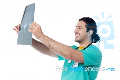 Cheerful Male Doctor With X-ray Stock Photo