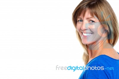 Cheerful Middle Aged Blonde With Copy Space Stock Photo