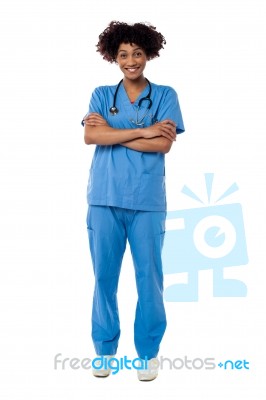 Cheerful Nurse Posing With Arms Crossed Stock Photo