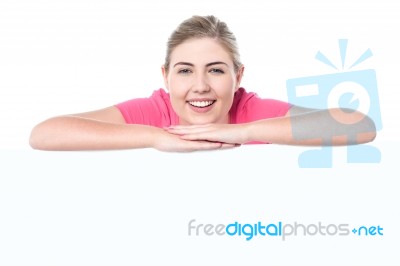 Cheerful Teen Behind Blank Whiteboard Stock Photo