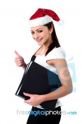 Cheerful Woman Giving Good Wishes For Christmas Stock Photo