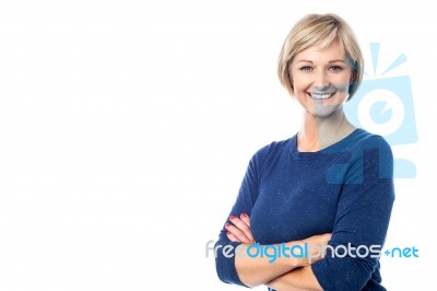 Cheerful Woman Posing Confidently Stock Photo