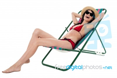 Cheerful Young Bikini Model Relaxing And Having Fun Stock Photo