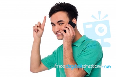 Cheerful Young Boy Communicating Stock Photo