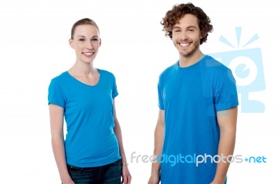 Cheerful Young Couple Posing Casually Stock Photo