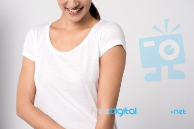 Cheerful Young Woman Posing Caually Stock Photo