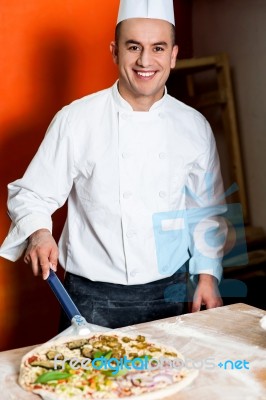 Chef Busy In Preparing Pizza Stock Photo