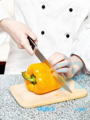 Chef Cutting Bell Peppers Stock Photo