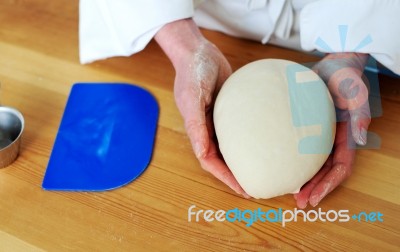 Chef Holding Dough Stock Photo