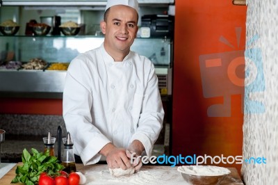 Chef Preparing Pizza Base Stock Photo